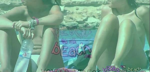  Two Pierced up Italian Lesbians sunbath topless showing pussy crack